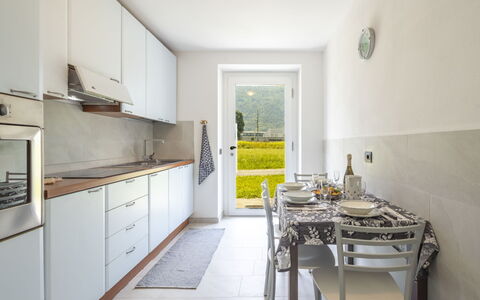 Isola Verde Garden Home: Flooring, Interior Design, Furniture, Floor, Kitchen, Countertop, Ceiling, Room, Kitchen Appliance, Cabinetry