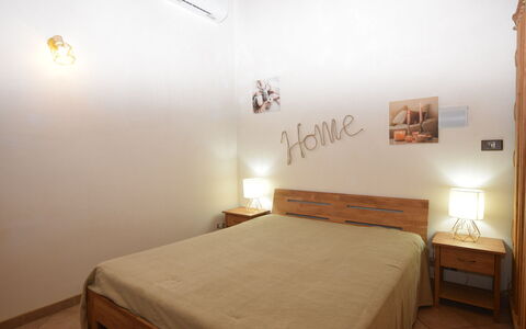 Villa Cigno Reale: Bed, Bedroom, Bedding, Interior Design, Furniture, Floor, Bed Sheet, Flooring, Wall, Wood