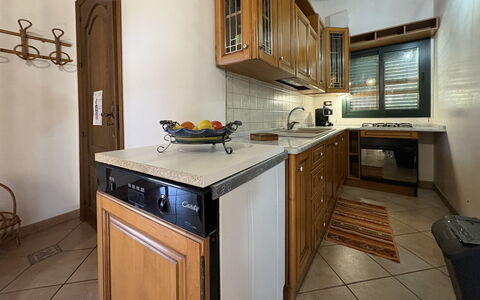 Il Cigno Reale Green: Countertop, Kitchen, Kitchen Appliance, Cabinetry, Major Appliance, Wood, Interior Design, Kitchen Sink, Flooring, Furniture