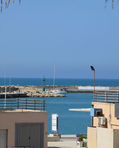 La Casa di Luigi: Sky, Sea, Ocean, Coast, Shade, Beach, Boat, Marina, Tropics
