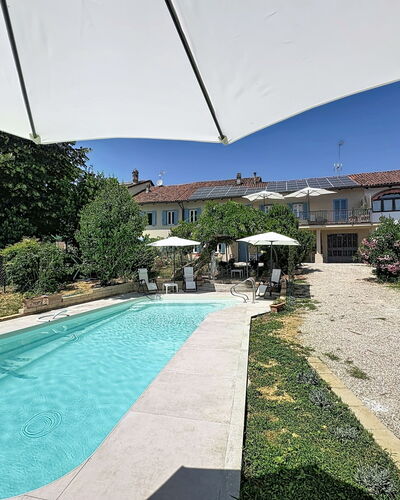 La Casetta di Palmira: Swimming Pool, Residential Area, Outdoor Furniture, Resort, Umbrella, Leisure, Estate, Hacienda, Shade, Villa
