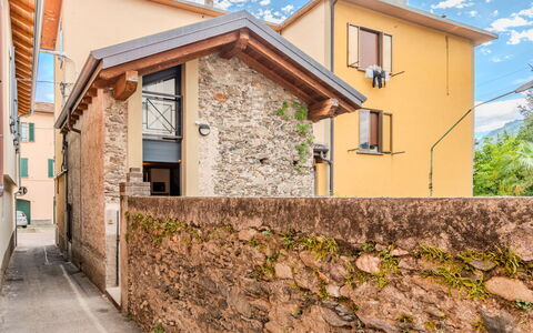 Tiny Loft: Wall, Architecture, House, Home, Door, Composite Material, Cottage, Balcony, Plaster