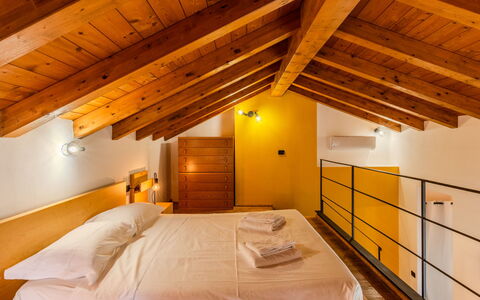 Tiny Loft: Interior Design, Ceiling, Resort, Wood Stain, Hotel, Hardwood, Bedroom, Bed Frame, Bed, Boutique Hotel