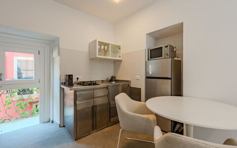 Via Monte Brione: Interior Design, Flooring, Floor, Room, Apartment, Ceiling, Kitchen, Chair, Countertop, Cabinetry