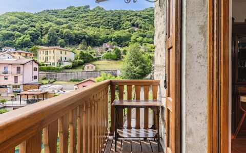 Casa Giamba: Balcony, Apartment, Wood Stain, Hardwood, Baluster, Handrail, Mountain Village