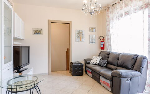 Sweet Loreto: Furniture, Interior Design, Flooring, Floor, Couch, Room, Wood, Living Room, Television, Lighting