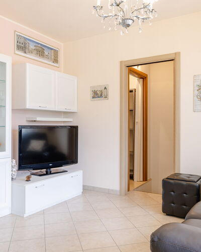 Sweet Loreto: Furniture, Interior Design, Flooring, Wood, Room, Floor, Ceiling, Television, Living Room, Lighting