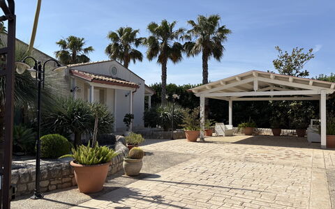 Villa Monaco: Shade, Flowerpot, Hacienda, Flagstone, Outdoor Structure, Estate, Landscaping, Garden