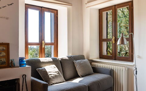 Casetta Pantasina: Furniture, Interior Design, Wall, Wood, Flooring, Room, Floor, Living Room, Home, Couch