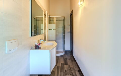 Melissa: Flooring, Floor, Interior Design, Ceiling, Lighting, Room, Plumbing Fixture, Plumbing, Bathroom, Tap
