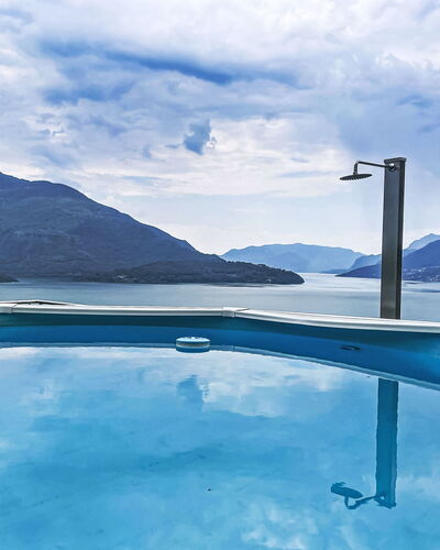 Melissa: Blue, Water, Mountainous Landforms, Mountain, Hill, Swimming Pool, Mountain Range, Coastal And Oceanic Landforms, Lake, Sea