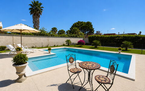 Villa Gloria: Swimming Pool, Blue, Water, Resort, Outdoor Furniture, Water Feature, Composite Material, Flagstone, Eco Hotel, Tile