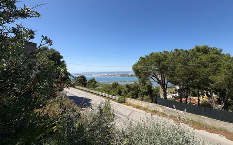 Villa Marzia - Augusta: Sky, Blue, Tree, Leaf, Vegetation, Shrub, Thoroughfare, Coast, Fence