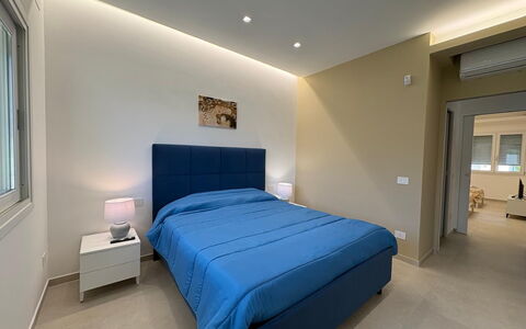 Villa Marzia - Augusta: Furniture, Bed, Interior Design, Flooring, Floor, Bedroom, Wood, Ceiling, Room, Lighting