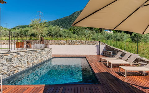 Aura: Swimming Pool, Hill, Mountain Range, Composite Material, Deck, Eco Hotel, Hardwood, Ridge, Wood Flooring, Plank