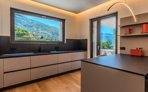 Aura: Interior Design, Kitchen, Countertop, Flooring, Wood, Furniture, Ceiling, Light Fixture, Home, Cabinetry