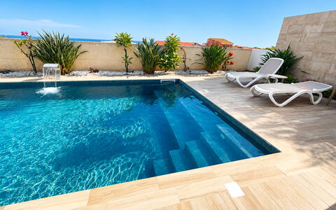 A Casa di Gio: Blue, Swimming Pool, Flooring, Floor, Composite Material, Resort, Outdoor Furniture, Leisure, Water Feature, Shade