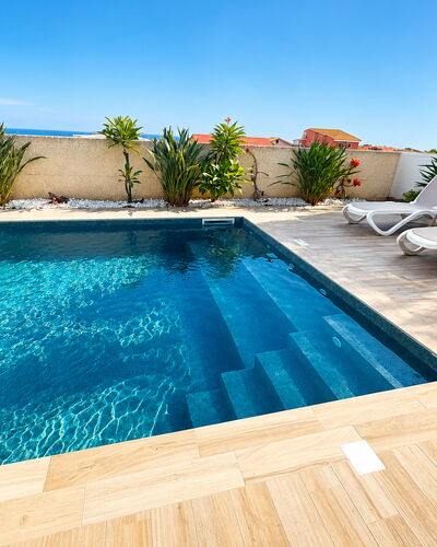 A Casa di Gio: Blue, Swimming Pool, Flooring, Floor, Composite Material, Resort, Outdoor Furniture, Leisure, Water Feature, Shade