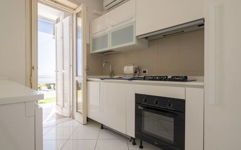 Villa Eva: Kitchen, Major Appliance, Kitchen Appliance, Interior Design, Flooring, Countertop, Cabinetry, Floor, Furniture, Home