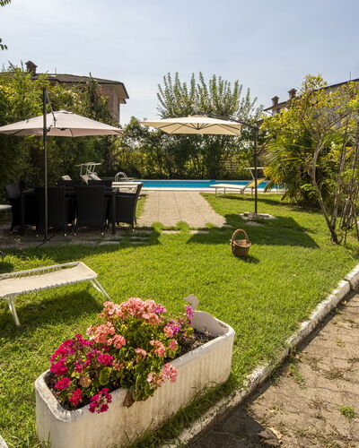 Villa Eva: House, Residential Area, Swimming Pool, Outdoor Furniture, Garden, Landscaping, Resort, Lawn, Yard