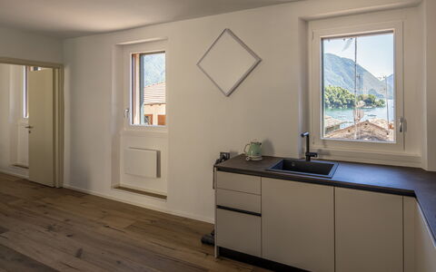 Next Comacina, Lago di Como with Garage: Flooring, Wood, Interior Design, Floor, Countertop, Ceiling, Wood Flooring, Kitchen, Home, Furniture