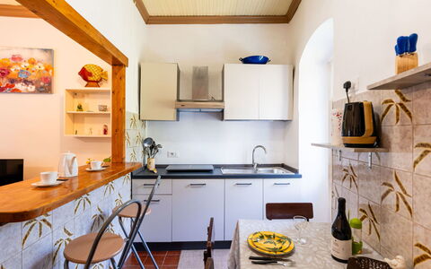 Oliver: Furniture, Interior Design, Flooring, Wood, Kitchen, Countertop, Floor, Ceiling, Room, Lighting
