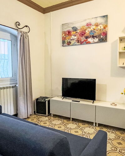 Enrico: Interior Design, Furniture, Flooring, Wall, Floor, Wood, Room, Lighting, Couch, Living Room