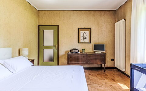 Villa Giulia: Interior Design, Flooring, Wall, Floor, Furniture, Wood, Bed, Bedroom, Lighting, Room