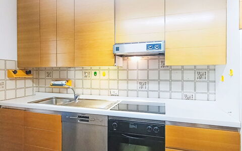 Locanda dei Nonni: Kitchen, Kitchen Appliance, Countertop, Major Appliance, Flooring, Cabinetry, Wood, Yellow, Kitchen Sink, Interior Design