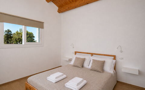 Villa Blue: Wall, Wood, Interior Design, Ceiling, Floor, Flooring, Bedroom, Bed, Furniture, Home