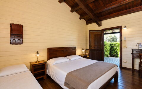 La Muraglia: Wood, Furniture, Door, Ceiling, Cottage, Hardwood, Wood Stain, Porch, Chair, Plank