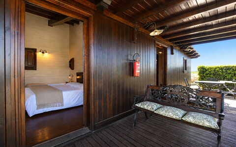 La Muraglia: Wood, Furniture, Hardwood, Wood Stain, Plank, Deck, Chair, Wood Flooring, Bed, Balcony