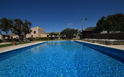 La Muraglia: Swimming Pool, Estate, Shade, Hacienda, Outdoor Furniture, Landscaping, Resort, Villa, Courtyard