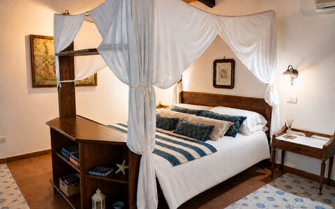 Villa Gertrude: Furniture, Bed, Interior Design, Bedroom, Bedding, Wood, Floor, Room, Linens, Bed Sheet