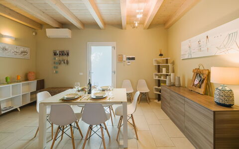 Casa delle Rondini: Furniture, Interior Design, Flooring, Floor, Table, Wood, Ceiling, Chair, Room, Couch