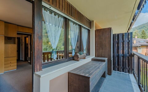 Presanella: Wood, Ceiling, Interior Design, Wood Stain, Hardwood, Shade, Balcony, Daylighting, Living Room, Penthouse Apartment