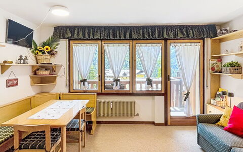 Presanella: Furniture, Interior Design, Wood, Room, Flooring, Ceiling, Floor, Lighting, Home, Couch