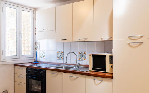 Lily: Kitchen Appliance, Kitchen, Major Appliance, Countertop, Wood, Cabinetry, Flooring, Kitchen Sink, Interior Design, Room