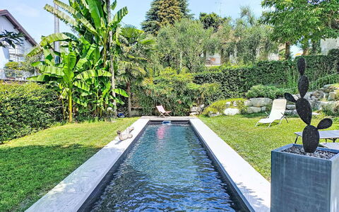 Emma: Shrub, Garden, Swimming Pool, Water Feature, Landscaping, Shade, Reflecting Pool, Backyard, Reflection, Yard