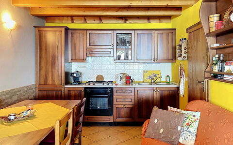 Baita Melissa: Furniture, Interior Design, Wood, Kitchen, Flooring, Room, Countertop, Ceiling, Floor, Cabinetry