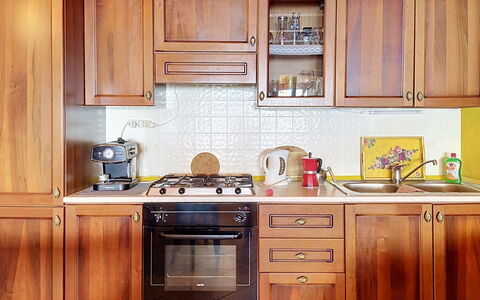 Baita Melissa: Cabinetry, Major Appliance, Wood, Kitchen Appliance, Kitchen, Furniture, Flooring, Countertop, Interior Design, Cupboard