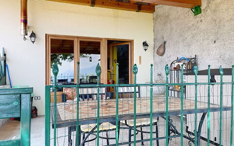 Baita Melissa: Iron, Balcony, Metal, Porch, Baluster, Wood Stain, Handrail, Fence, Hardwood, Outdoor Furniture
