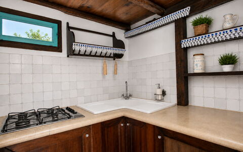 Casa Dafne: Kitchen, Wood, Interior Design, Countertop, Flooring, Kitchen Appliance, Kitchen Sink, Plumbing Fixture, Kitchen Stove, Tap
