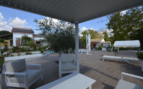 La Dimora di Diana: Furniture, Outdoor Furniture, Chair, Shade, Outdoor Structure, Porch, Resort, Patio, Eco Hotel, Pergola
