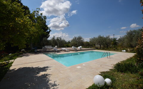 La Dimora di Diana: Swimming Pool, Shade, Resort, Garden, Outdoor Furniture, Landscaping, Flagstone, Water Feature, Concrete