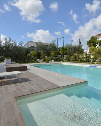La Dimora di Diana: Swimming Pool, Resort, Composite Material, Garden, Landscaping, Water Feature, Shade, Eco Hotel, Backyard, Leisure