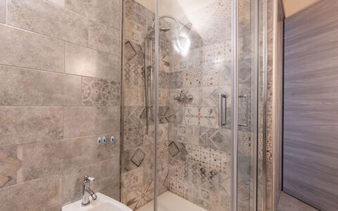 Noah: Flooring, Floor, Bathroom, Plumbing Fixture, Interior Design, Plumbing, Tile, Shower, Shower Head, Ceiling
