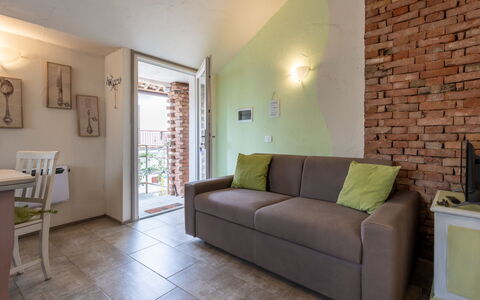 Noah: Wall, Furniture, Interior Design, Flooring, Floor, Couch, Ceiling, Room, Living Room, Apartment