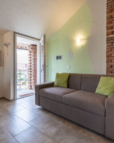 Noah: Wall, Furniture, Interior Design, Flooring, Floor, Couch, Ceiling, Room, Living Room, Apartment