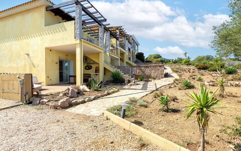 Sunset House Isola Rossa: Blue, Balcony, Handrail, Apartment, Fence, Sea, Resort, Condominium, Swimming Pool, Hotel